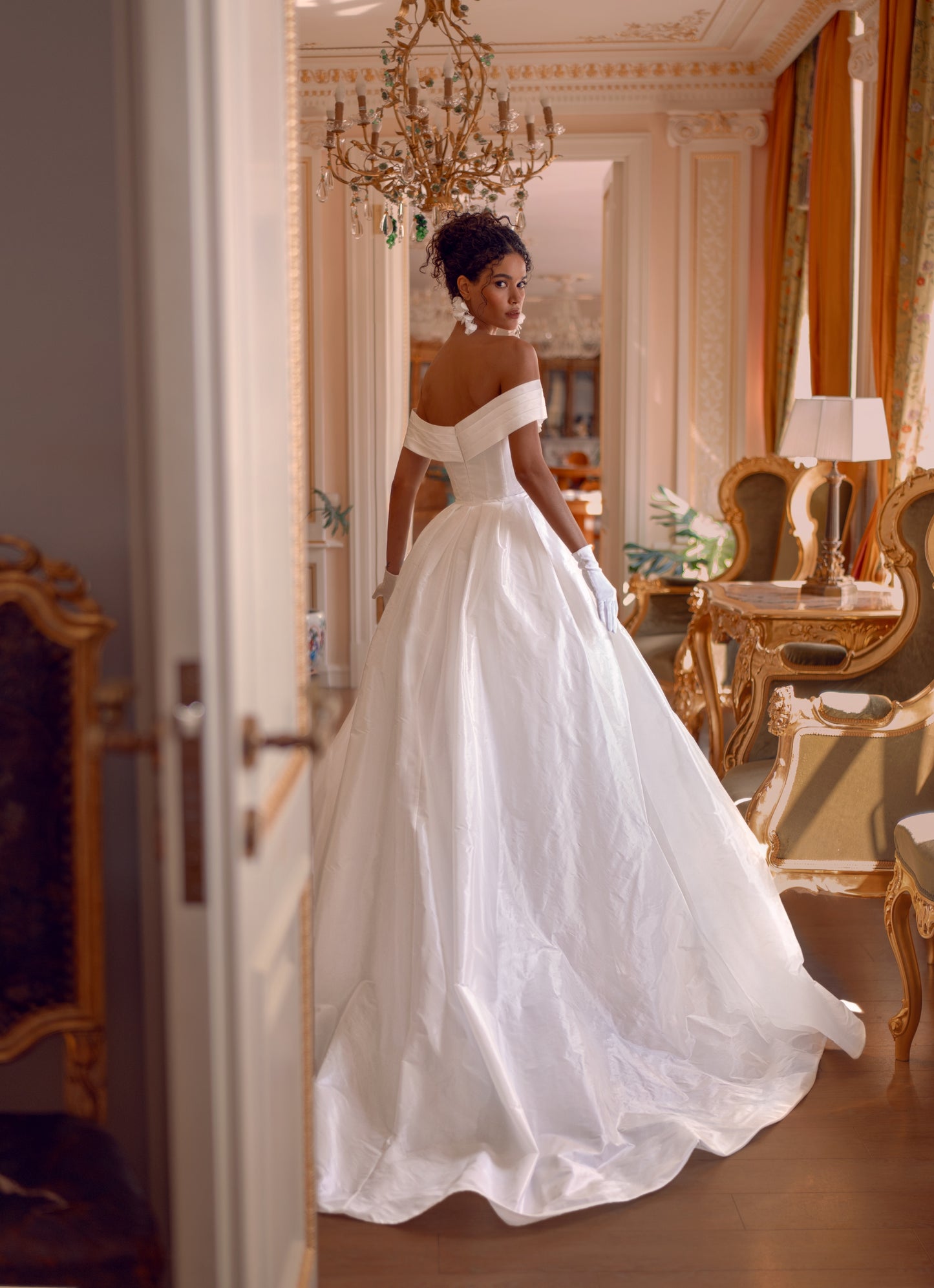 off-shoulder taffeta mermaid wedding dress with pleated bodice and detachable ball gown overskirt