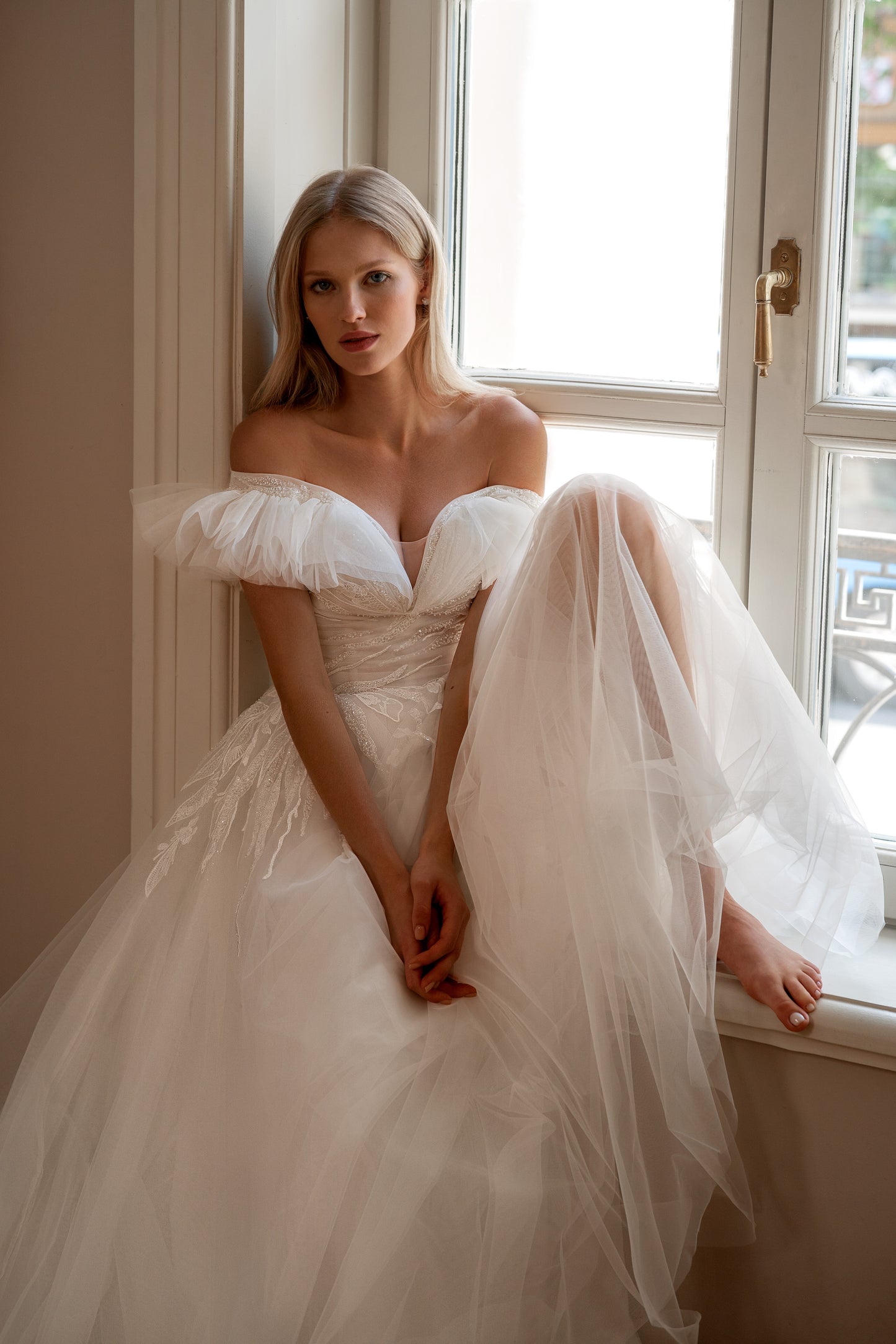 Off the shoulder A-line lace wedding dress with court train