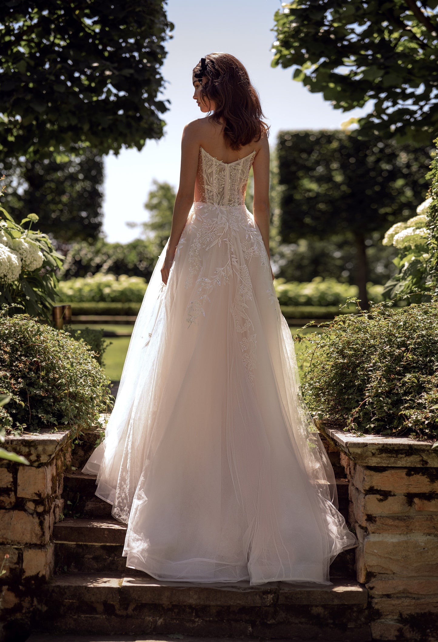 Sleeveless wedding dress with sweetheart neckline & open back
