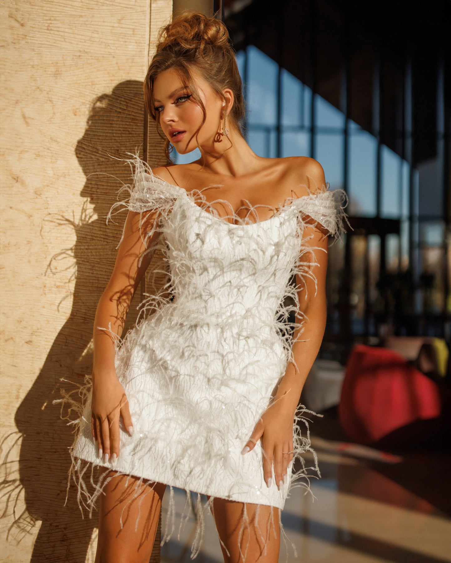 Mini wedding dress with scoop neckline and feathers