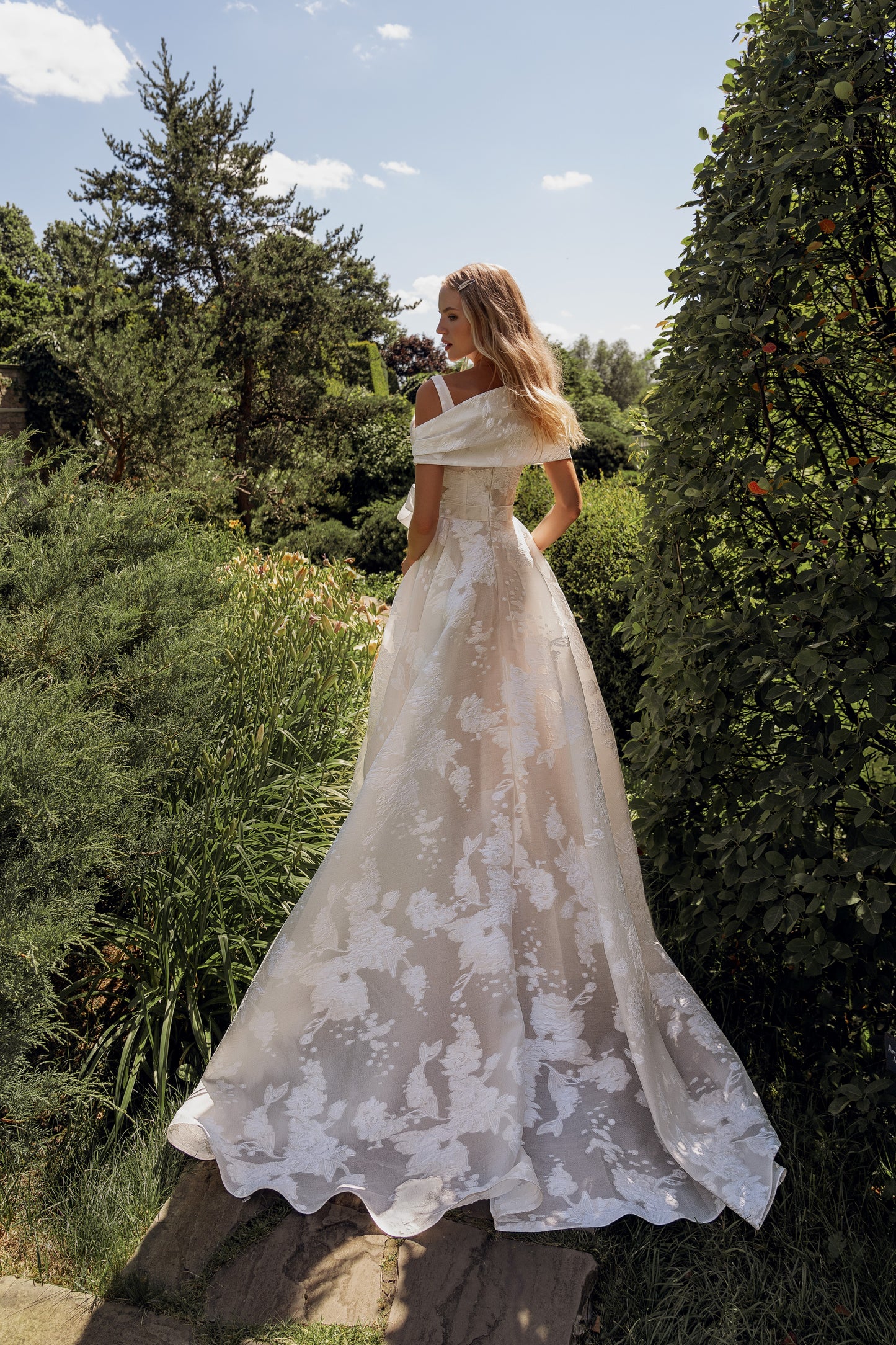 Sleeveless A-line wedding dress with floral jacquard details