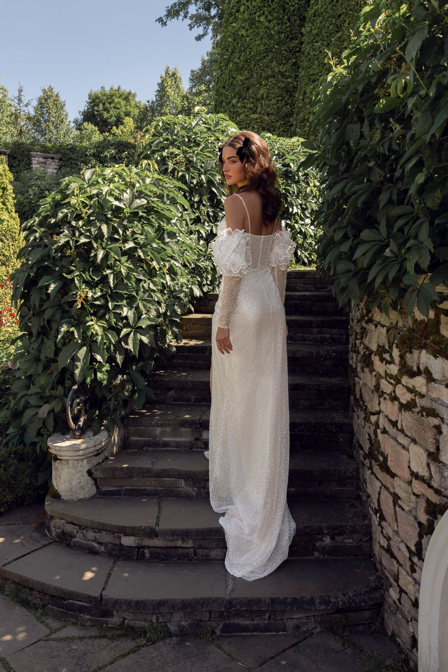 Sheath wedding dress with 3D floral sleeves