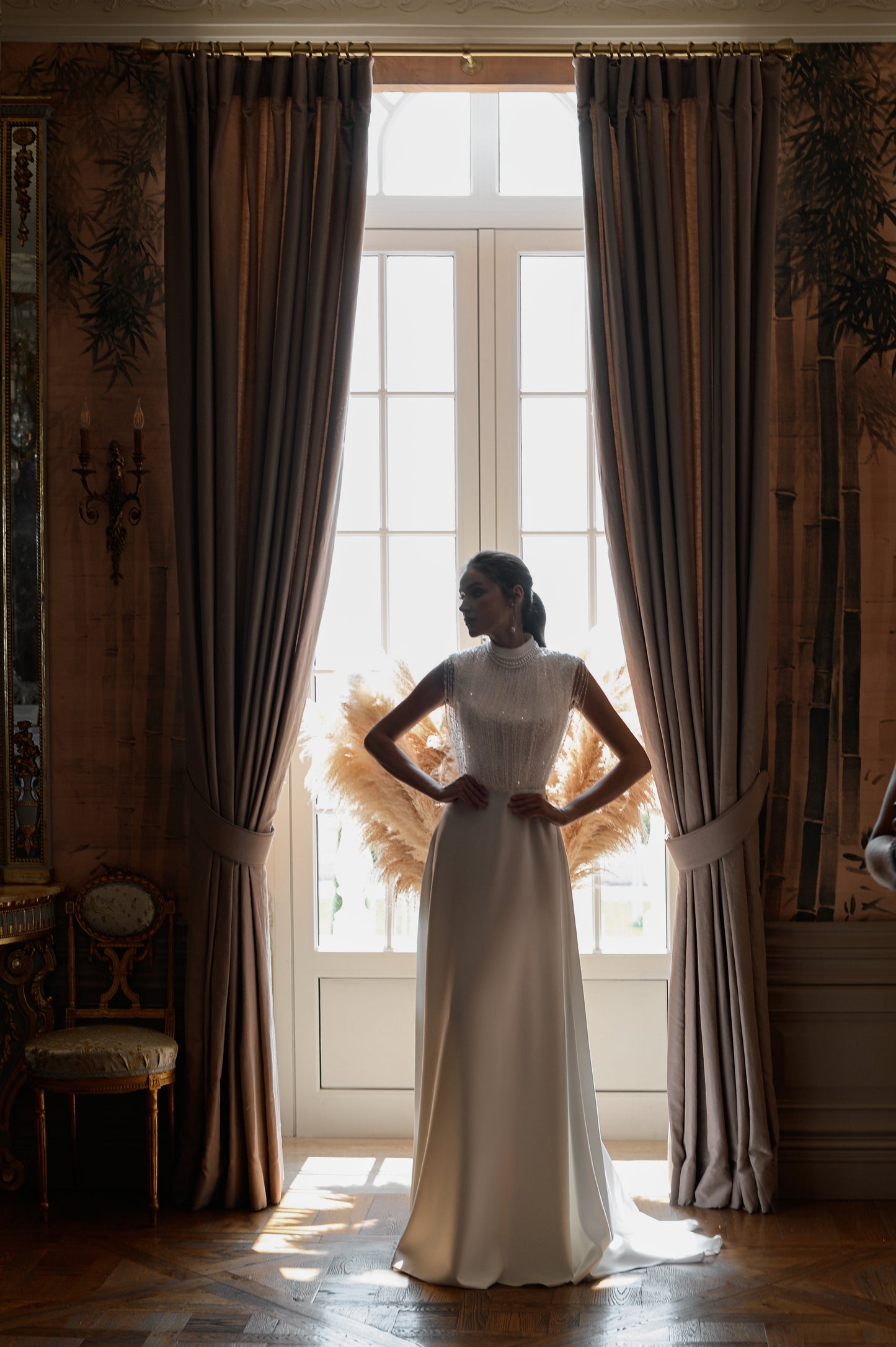 Sleeveless satin wedding dress with lace bodice & court train