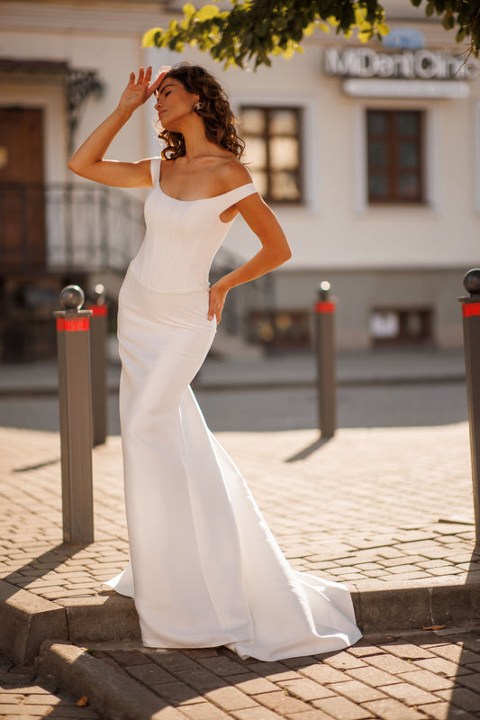Minimalist Mikado mermaid off-the-shoulder wedding dress.