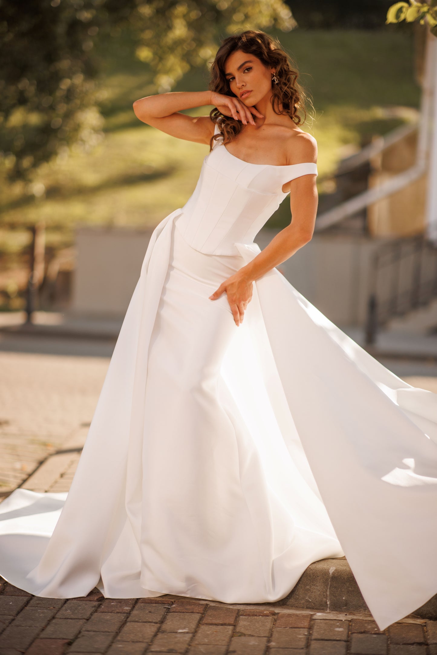Minimalist Mikado mermaid off-the-shoulder wedding dress.