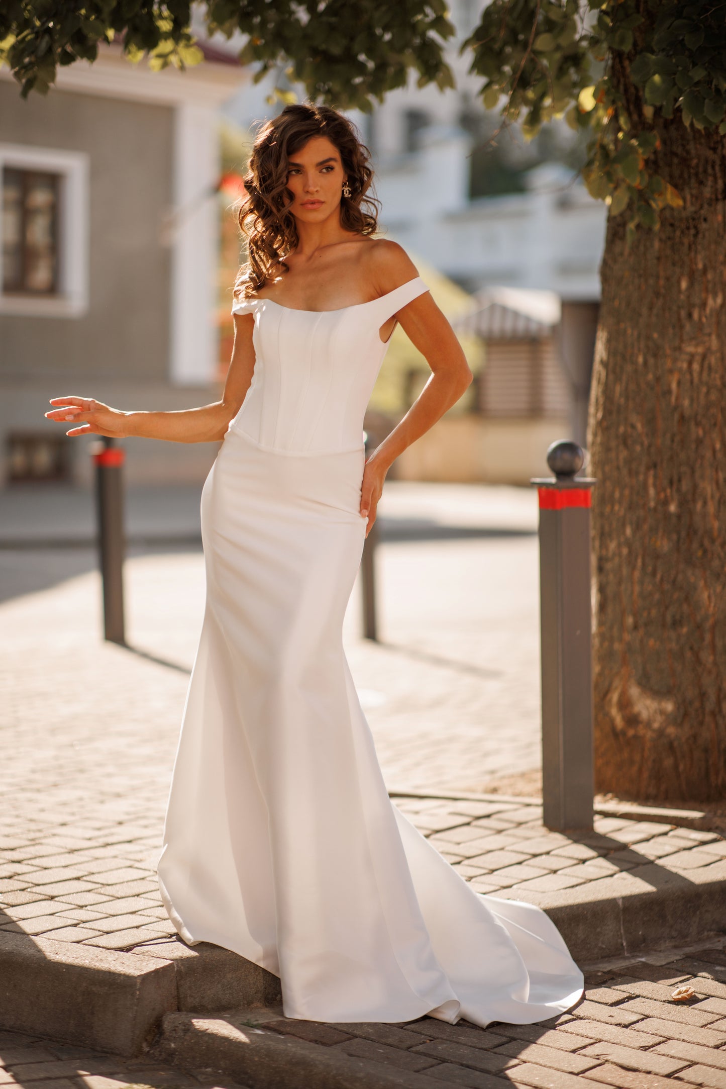 Minimalist Mikado mermaid off-the-shoulder wedding dress.