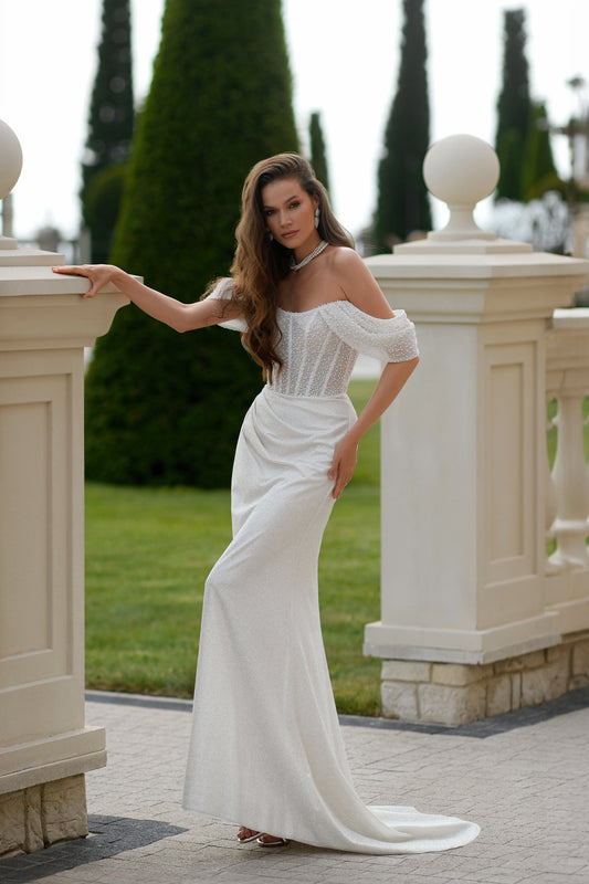 Glitter sheath wedding dress with sequin bodice and train.