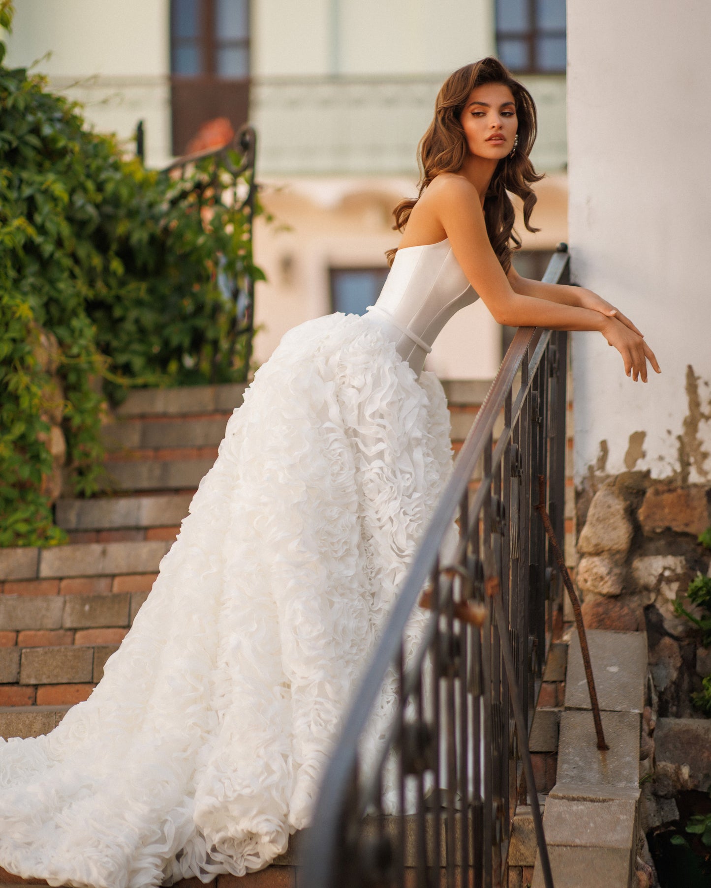 A-line Mikado wedding dress with chiffon 3D floral skirt.