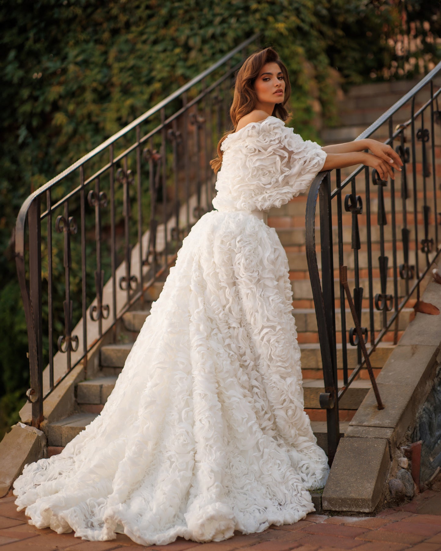 A-line Mikado wedding dress with chiffon 3D floral skirt.