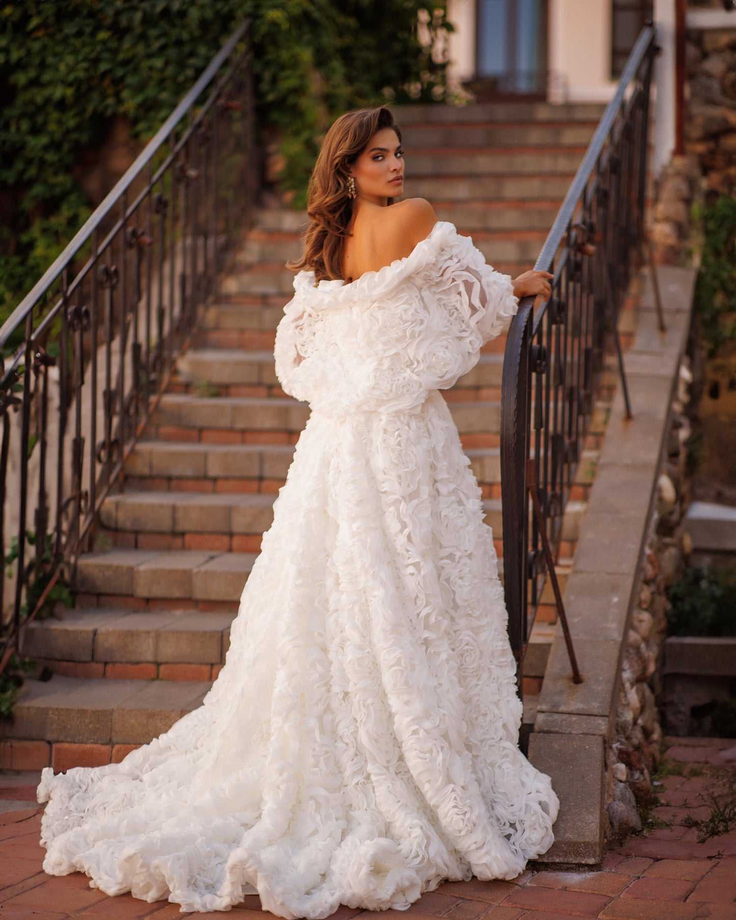 A-line Mikado wedding dress with chiffon 3D floral skirt.
