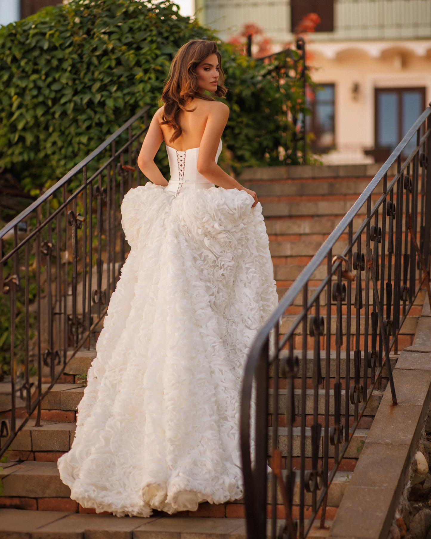 A-line Mikado wedding dress with chiffon 3D floral skirt.