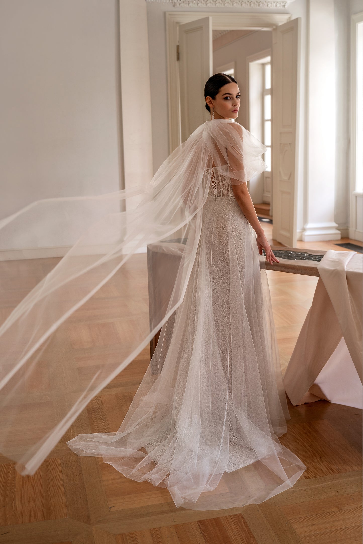 Mermaid wedding dress with corset and tulle train