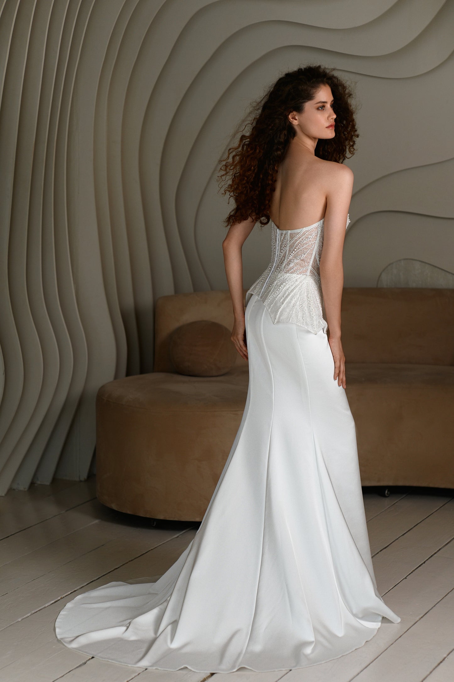 Sheath wedding dress with satin corset and Watteau train.