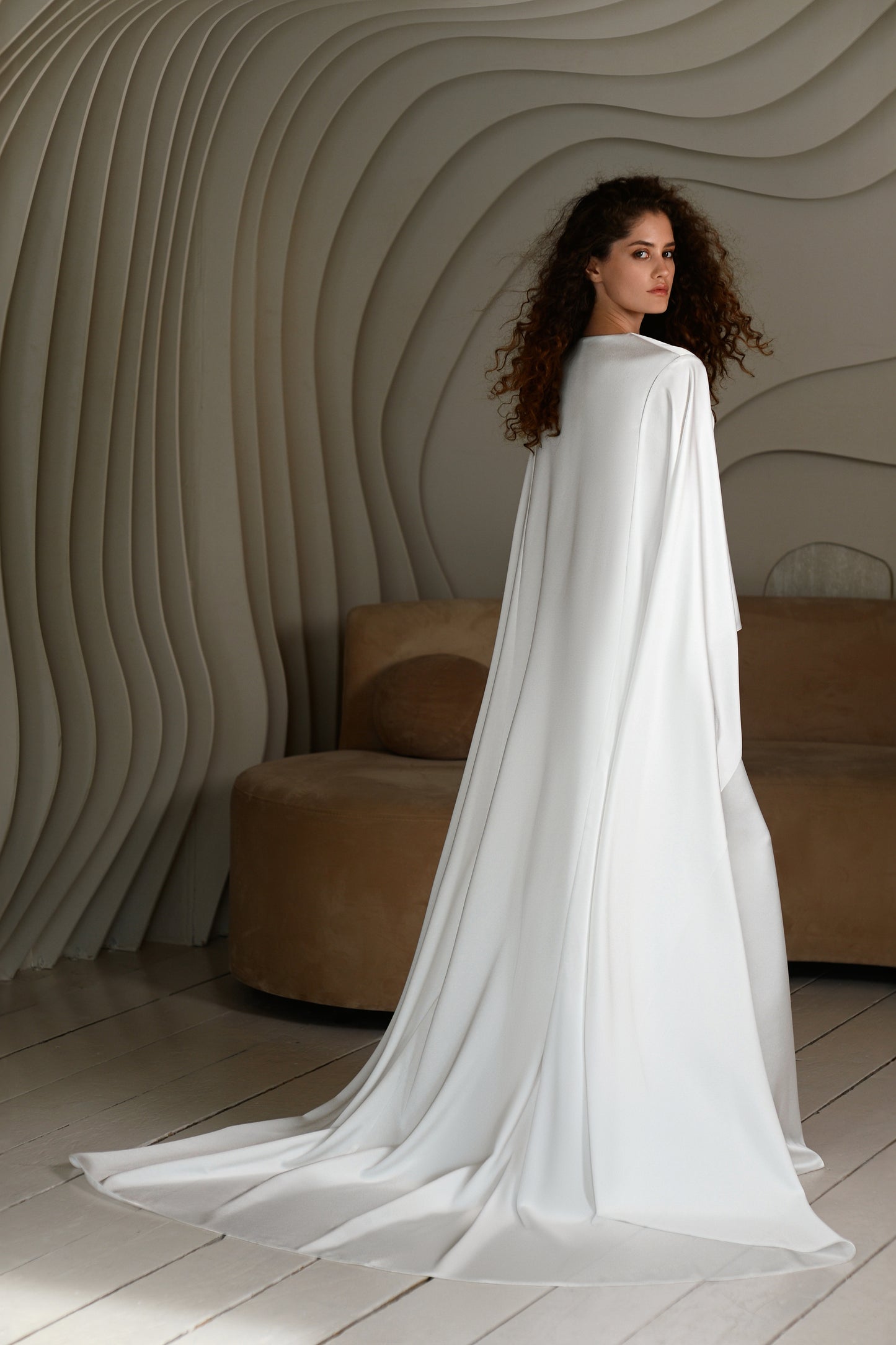 Sheath wedding dress with satin corset and Watteau train.