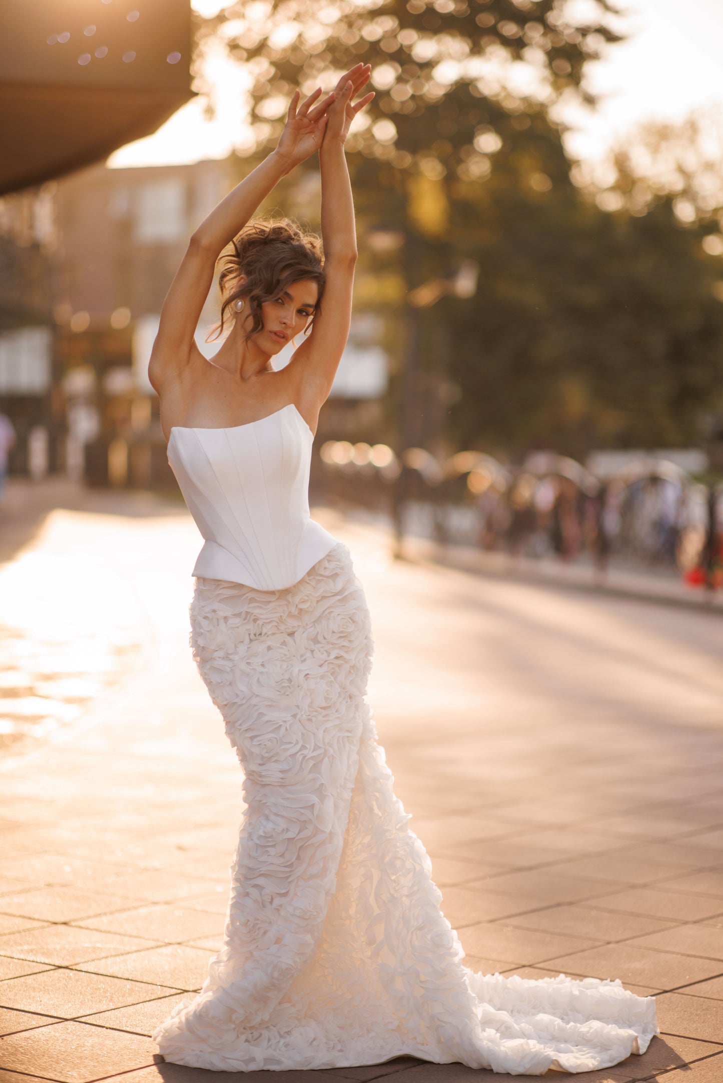 Mermaid wedding dress with boat neckline and ruffled fishtail train