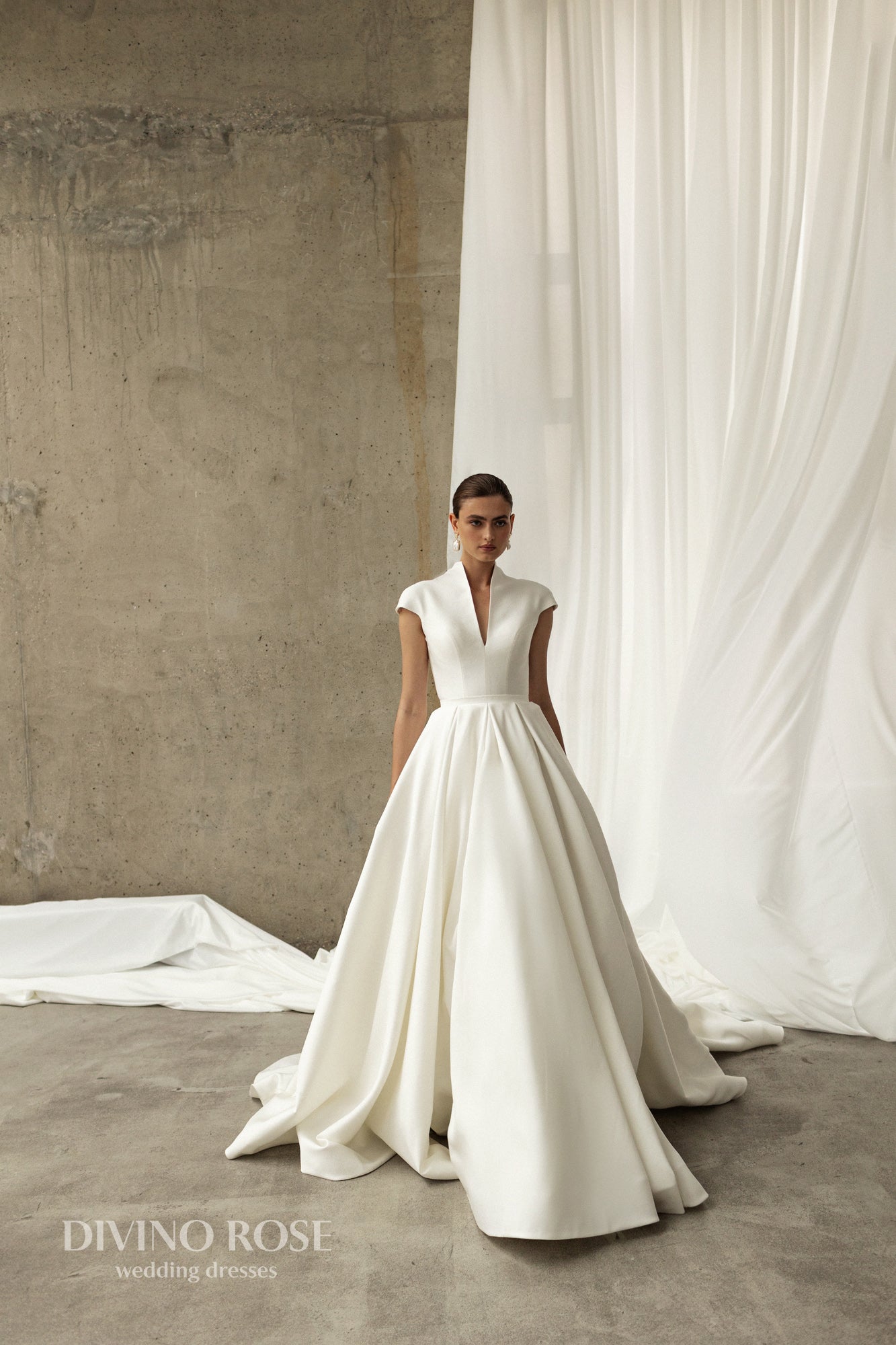 Minimalist Plain Sleeveless Halter neckline Open keyhole back Zip closure A-line Chapel train Mikado Wedding Dress