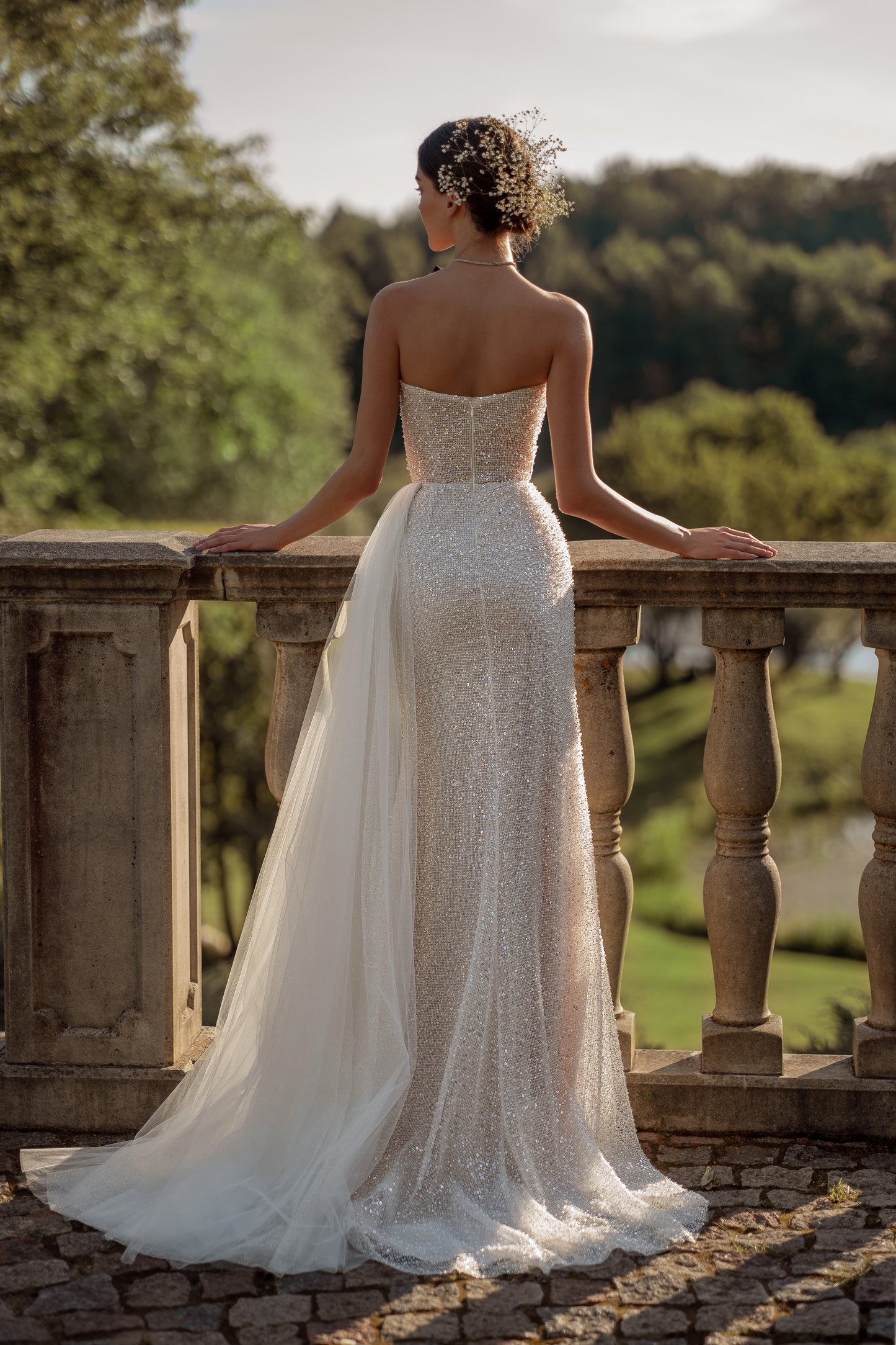 Fitted sequin lace wedding dress with tulle train and slit