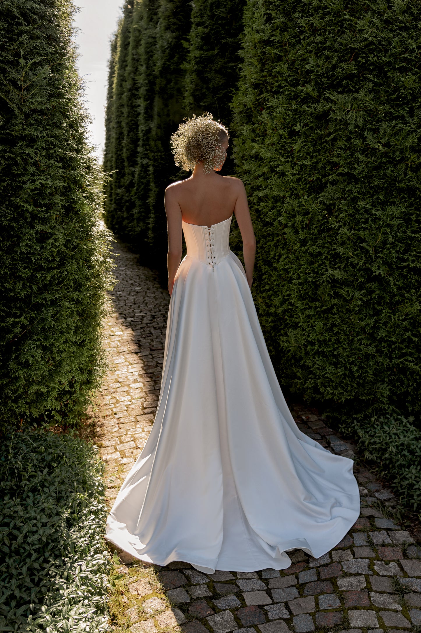 Minimalist satin A-line wedding dress with drop waist corset