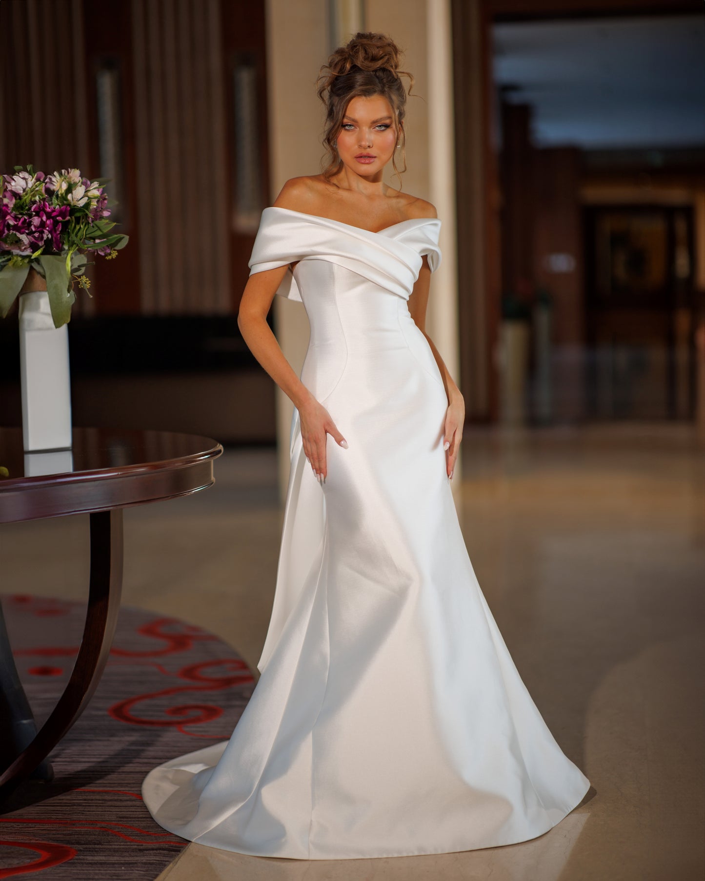 Mermaid Mikado wedding dress with fishtail train and bow.