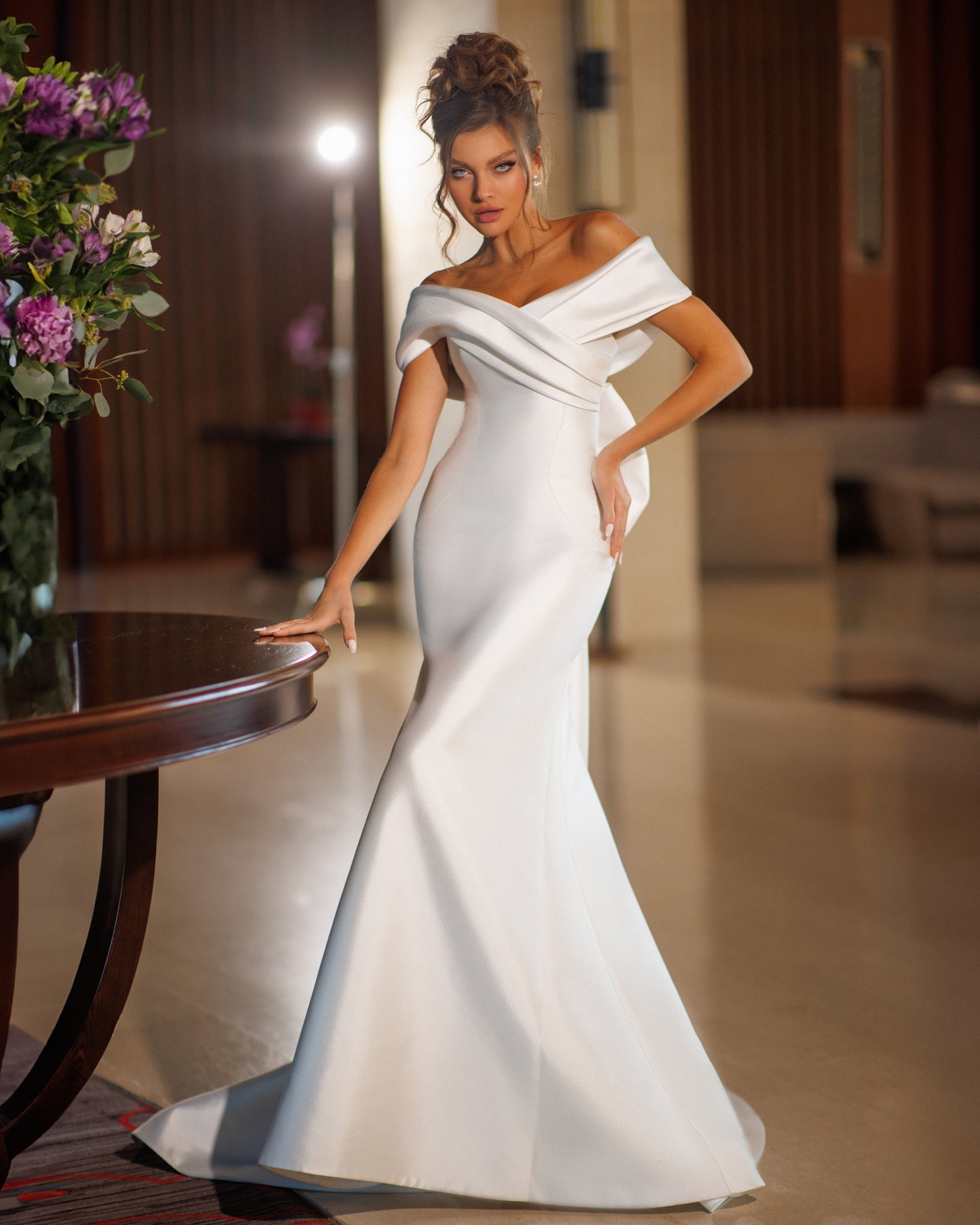 Mermaid Mikado wedding dress with fishtail train and bow.