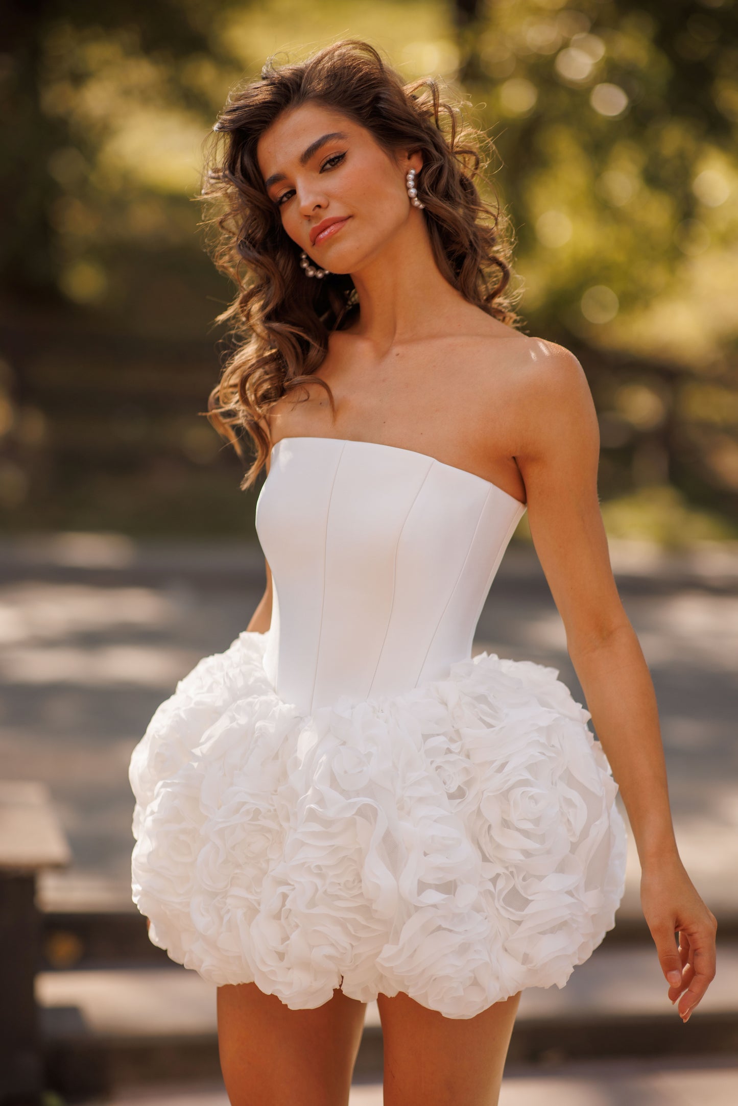 Mini above-knee wedding dress with ruffle skirt and lace-up back