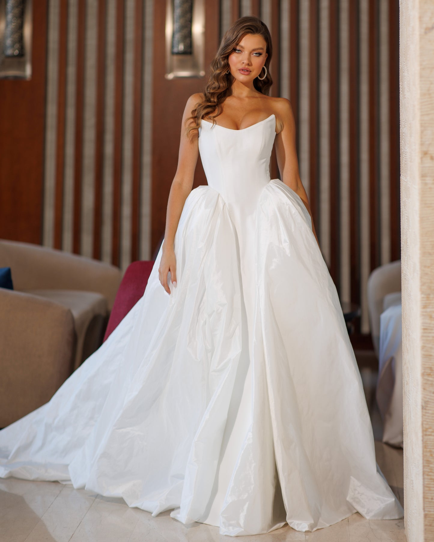 Princess wedding dress with chapel train and boat neckline.
