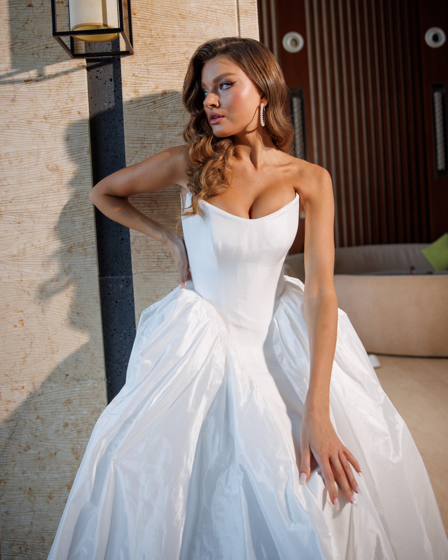 Princess wedding dress with chapel train and boat neckline.