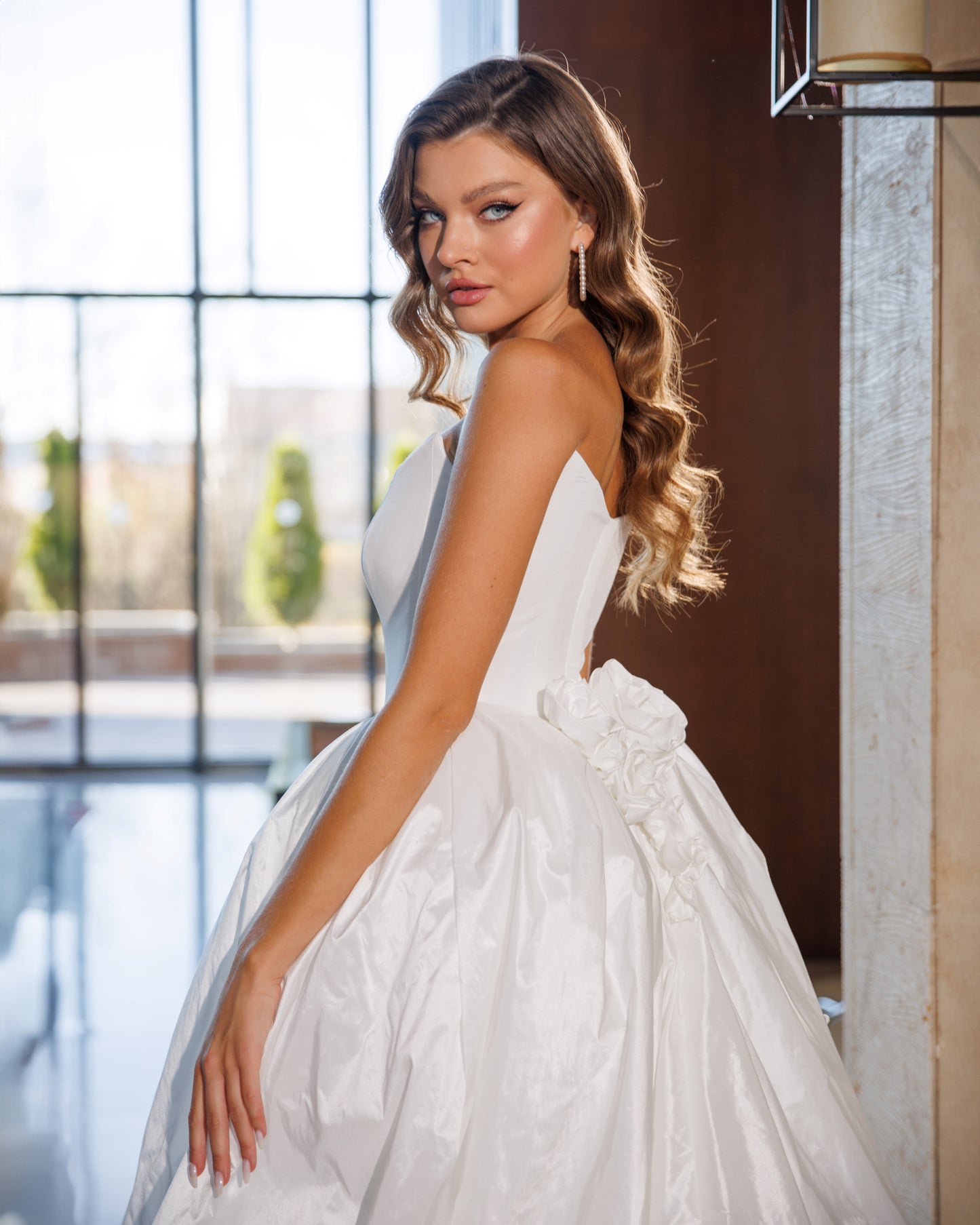 Princess wedding dress with chapel train and boat neckline.