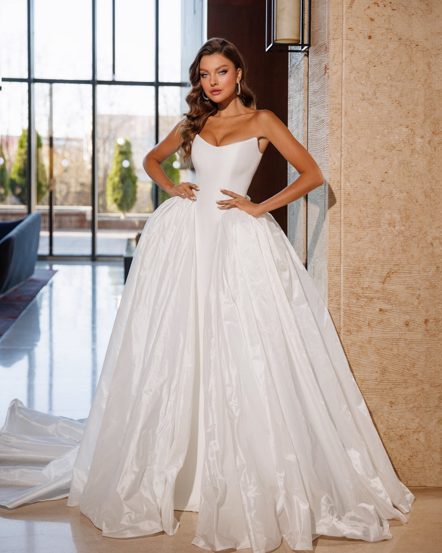 Princess wedding dress with chapel train and boat neckline.
