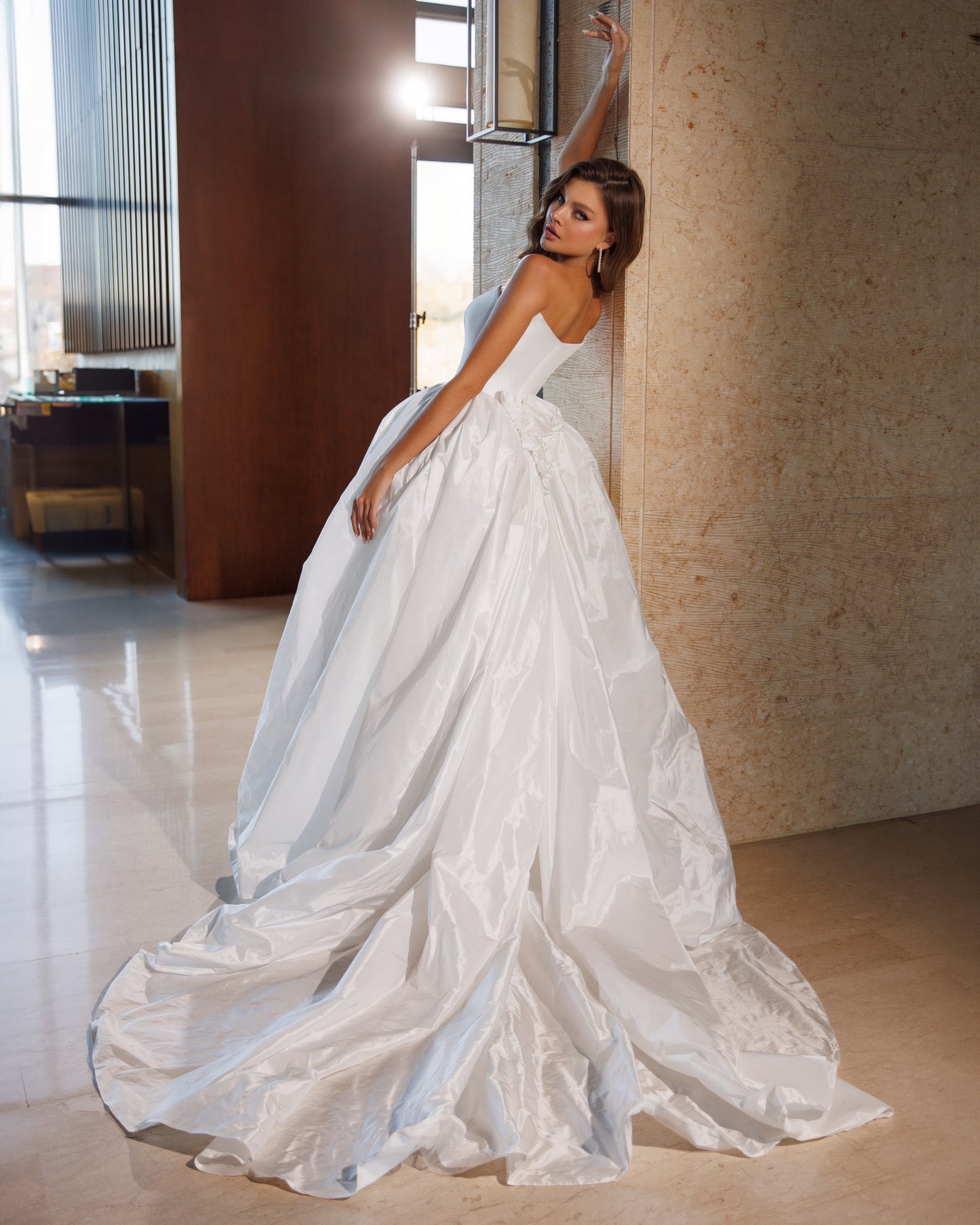 Princess wedding dress with chapel train and boat neckline.
