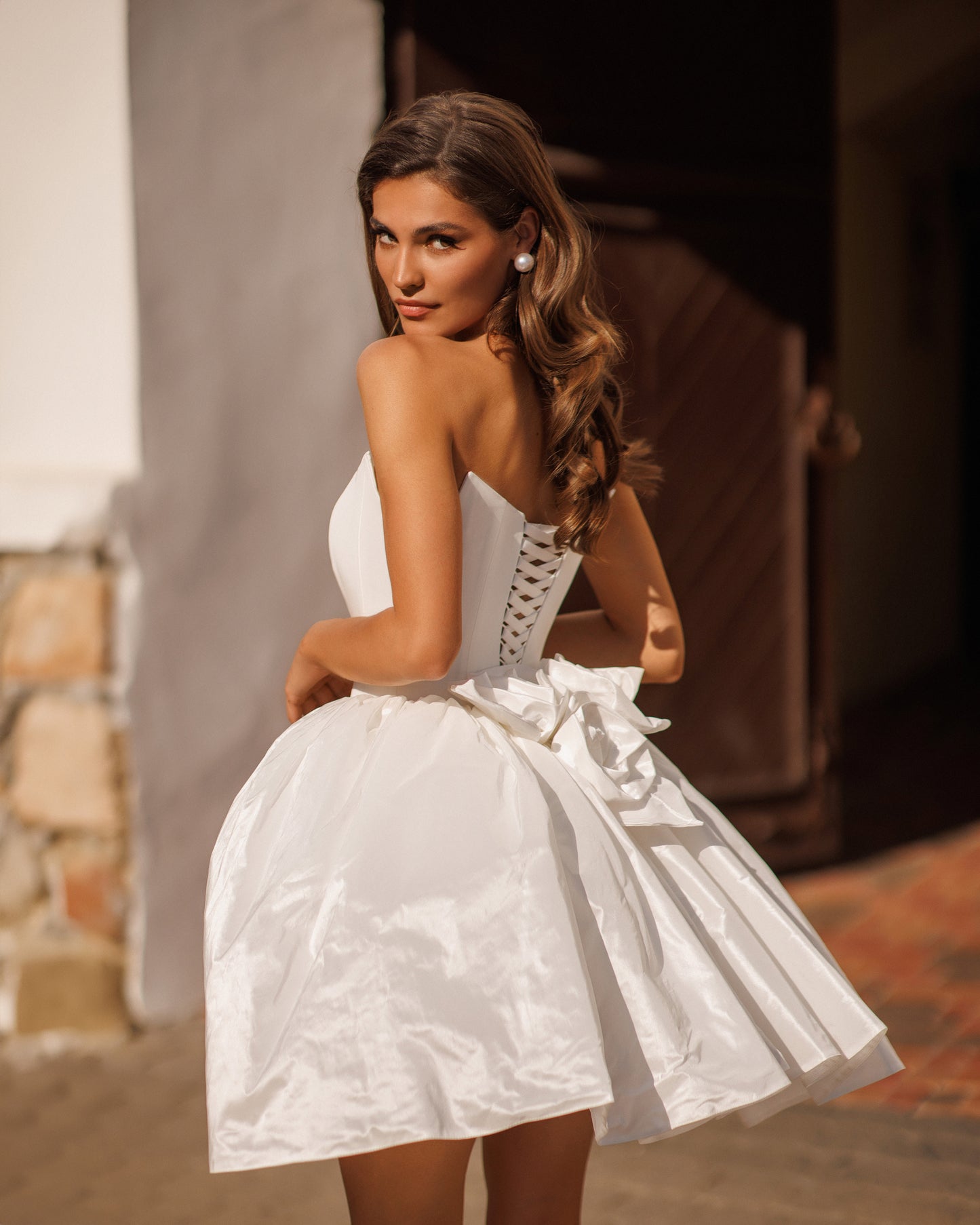 Mini wedding dress with princess silhouette and 3D floral back