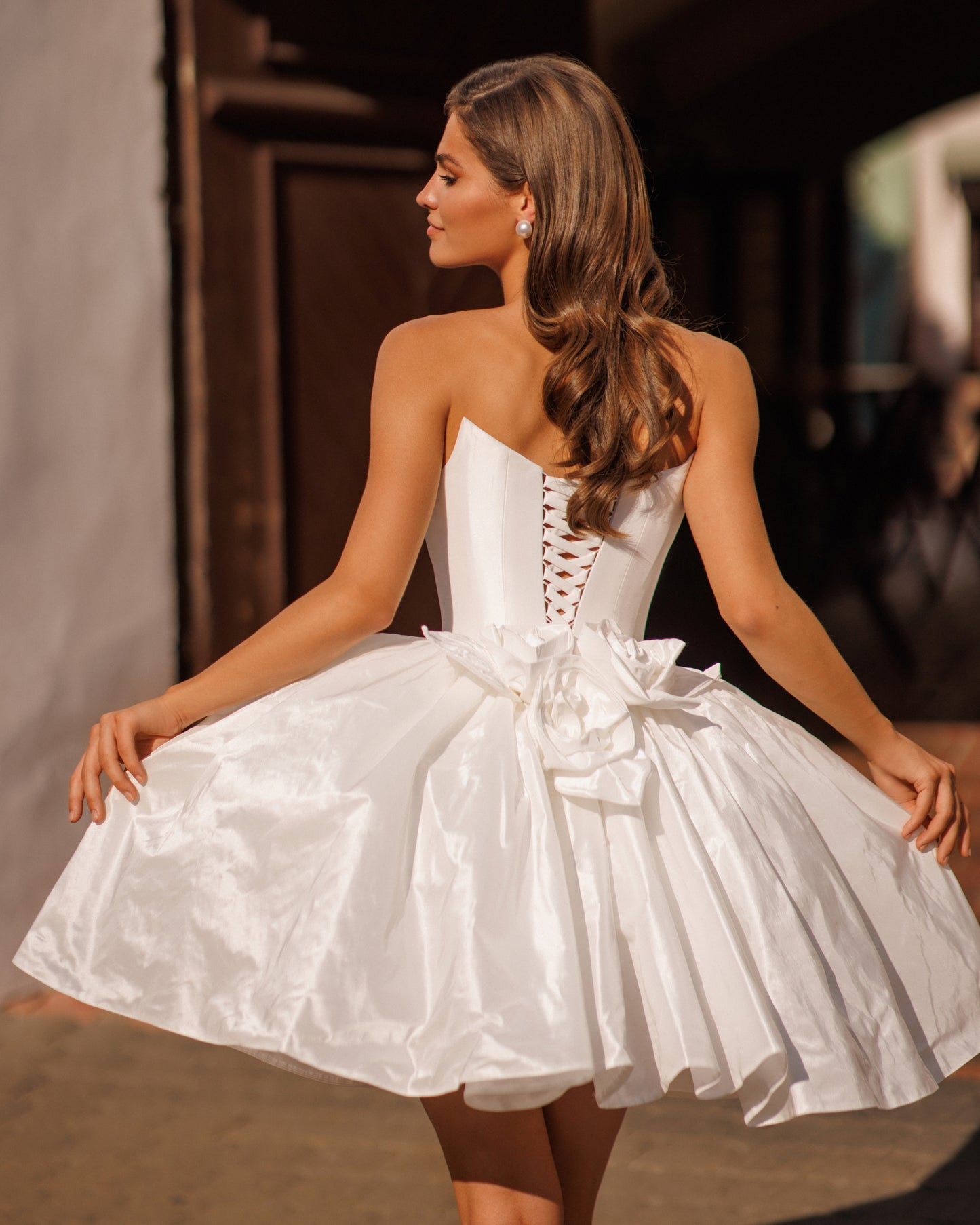 Mini wedding dress with princess silhouette and 3D floral back