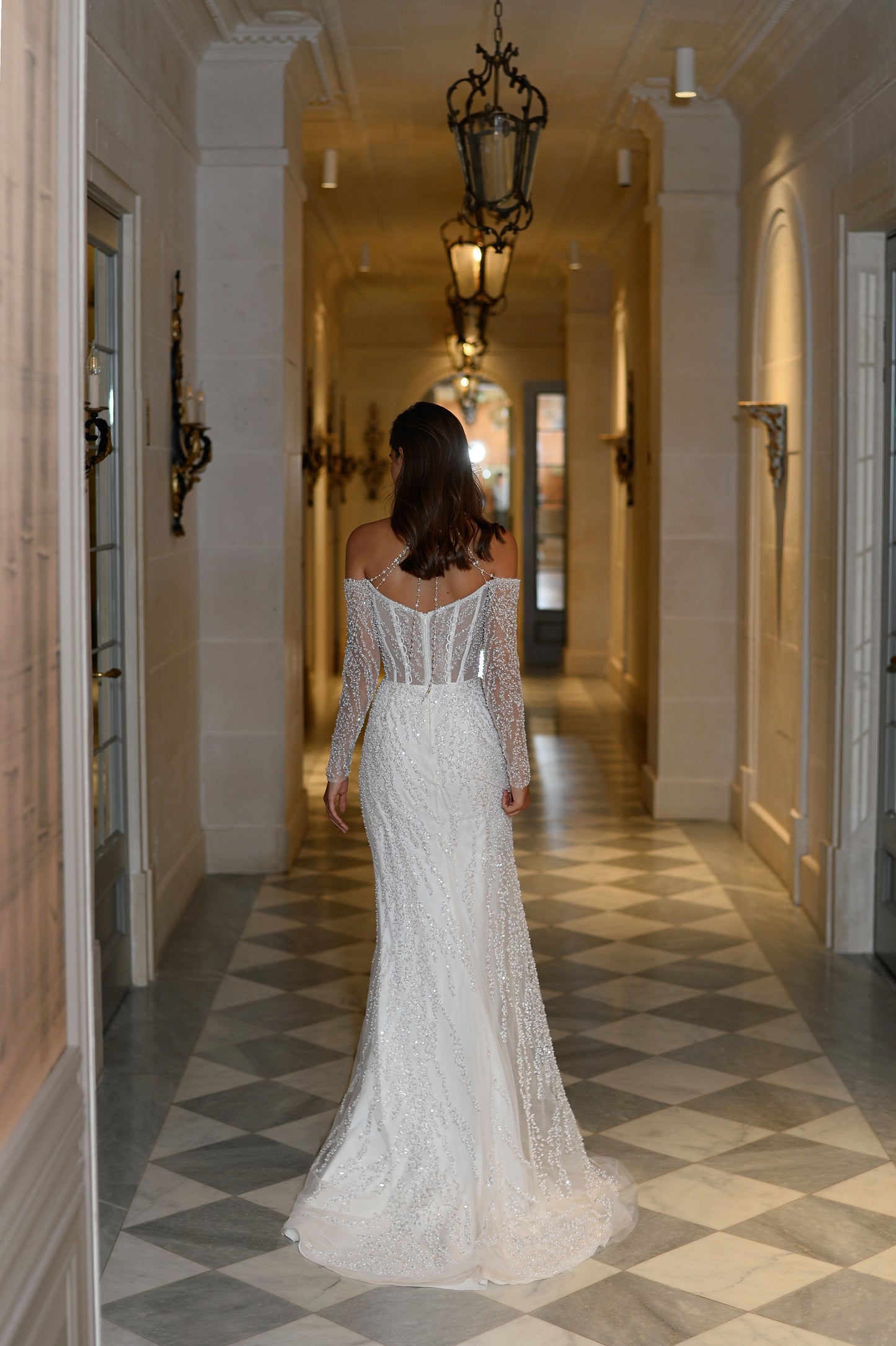 Mermaid trumpet wedding dress with illusion sleeves and lace