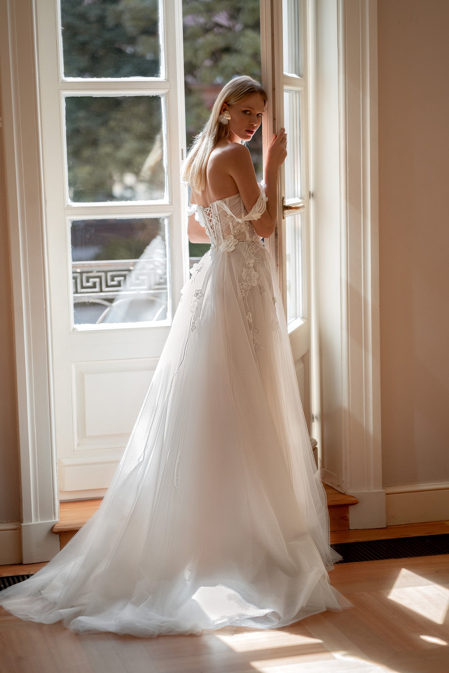 Off-the-shoulder A-line tulle wedding dress with 3D florals
