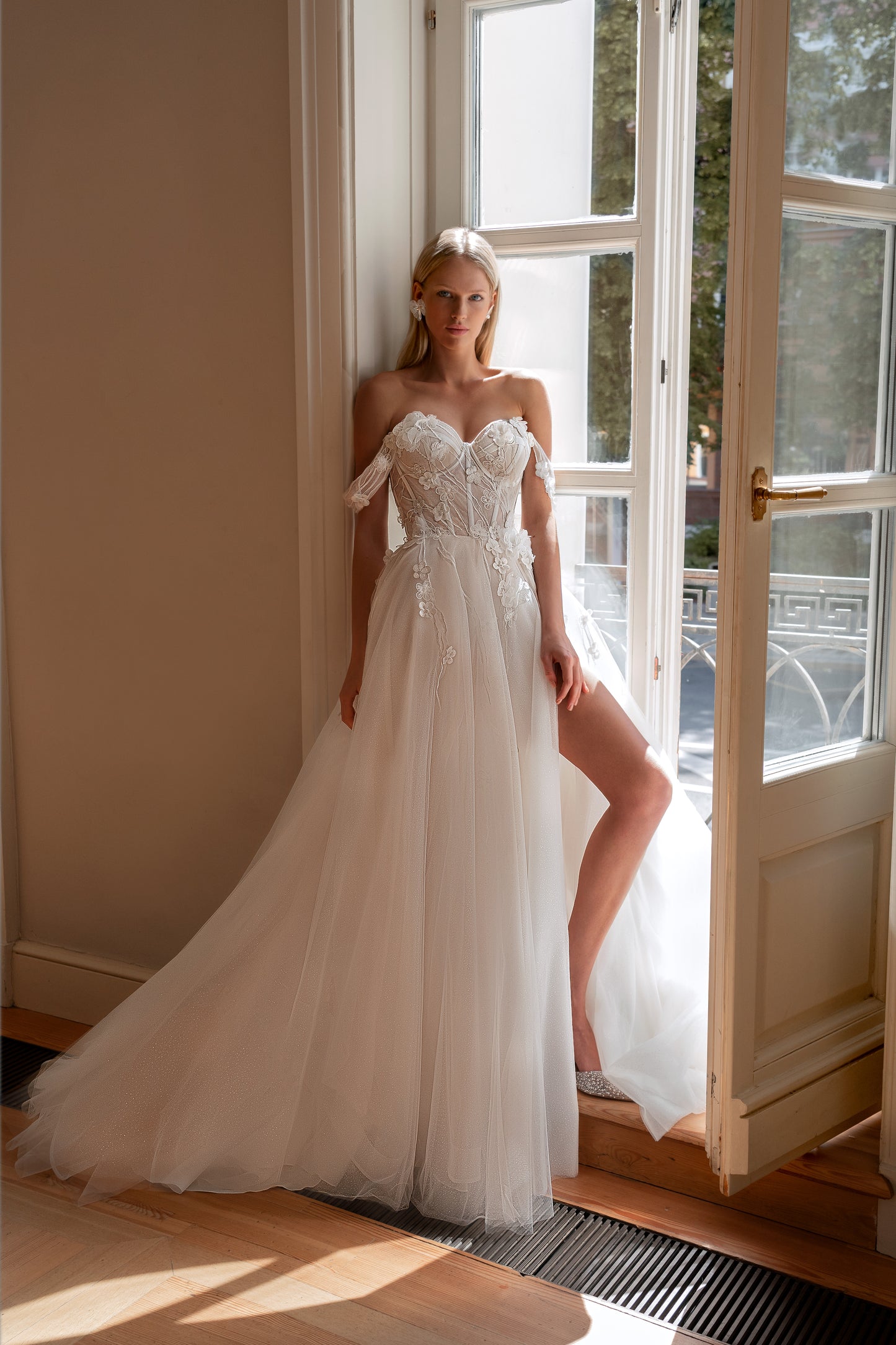 Off-the-shoulder A-line tulle wedding dress with 3D florals