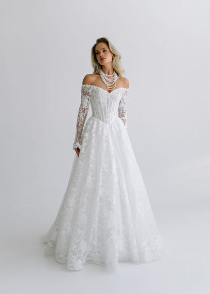 Sequin lace A-line wedding dress with an off-shoulder corset and long lace sleeves, front view