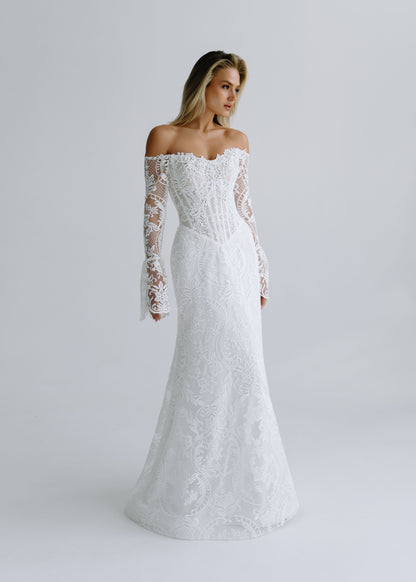 Lace fit-and-flare wedding dress with an off-shoulder corset and long lace sleeves, front view