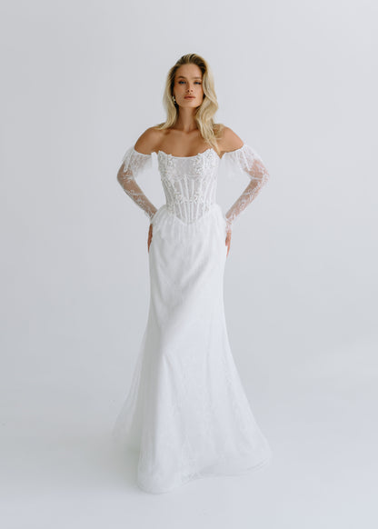 Lace fit-and-flare wedding dress with an off-shoulder corset and long lace sleeves, front view