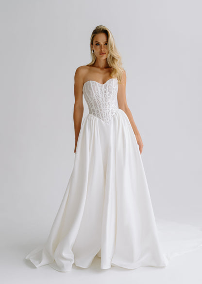 Strapless satin A-line wedding dress with a sweetheart lace corset, front view