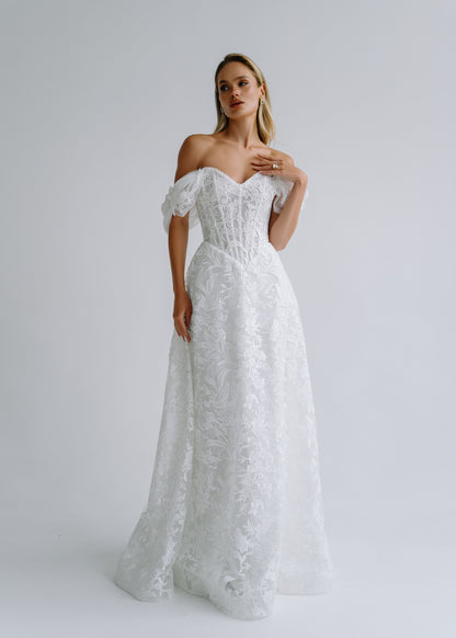 Floral lace A-line wedding dress with an off-shoulder neckline and organza flower sleeves, front view