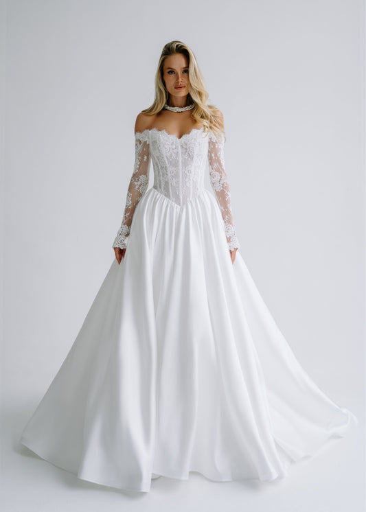 Satin A-line wedding dress with an off-shoulder lace corset and long lace sleeves, front view