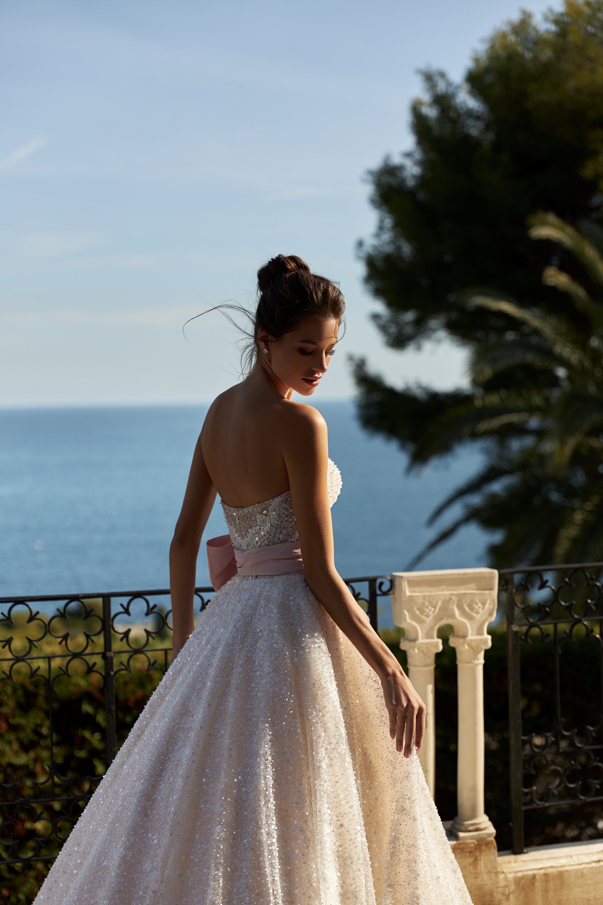 A-line sleeveless wedding dress with blush belt