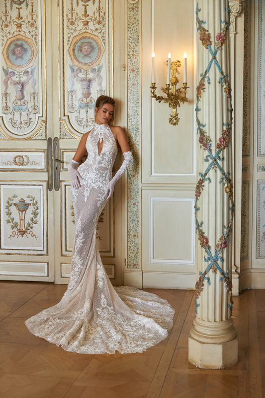 Fitted mermaid sleeveless wedding dress with stand-up collar, removable gloves, open back, lace appliques, bead and sequin embroidery, fishtail chapel train.