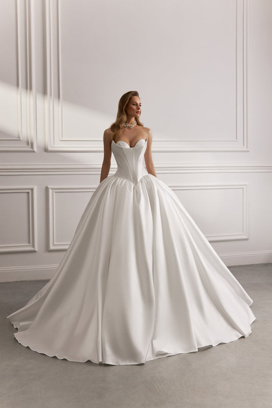 Sleeveless Princess Ball Gown A-line wedding dress with drop-down waist corset bodice, open back, glitter satin, and 80 cm chapel train.