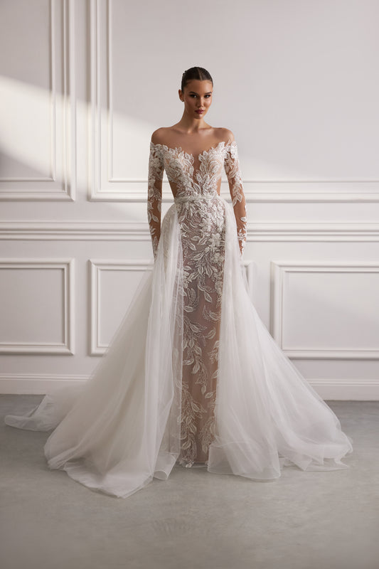 Sheath bridal gown with illusion sleeves, closed back, lace appliques, bead embroidery, sweep train, and optional tulle overskirt.