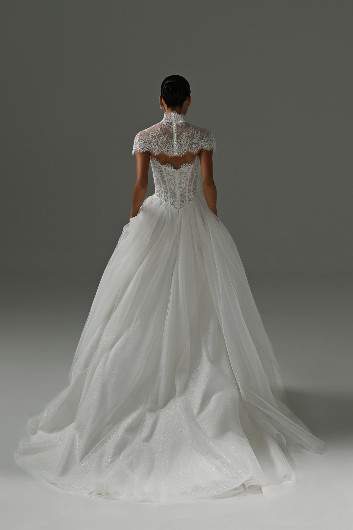 Tulle wedding dress with lace corset – back view of the tulle skirt and train
