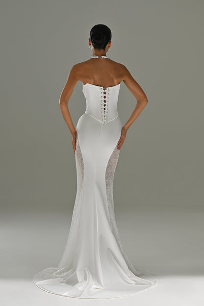 Satin mermaid wedding dress with strapless corset – back view of the lace-up corset back and train