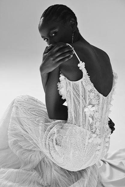 Lace mermaid wedding dress with fringe detail – black and white close-up of the fringe bodice