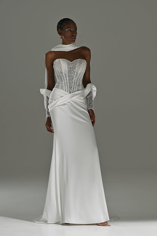 Satin sheath wedding dress with lace corset and draped hip detail – full-length front view with the detached sleeve