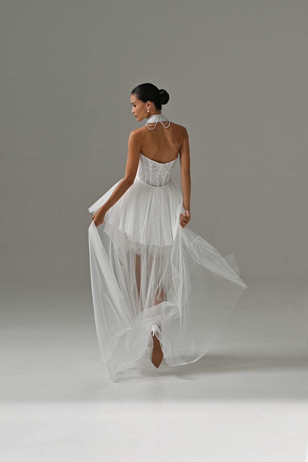 Lace mini wedding dress with detachable tulle train – back view of the sheer train